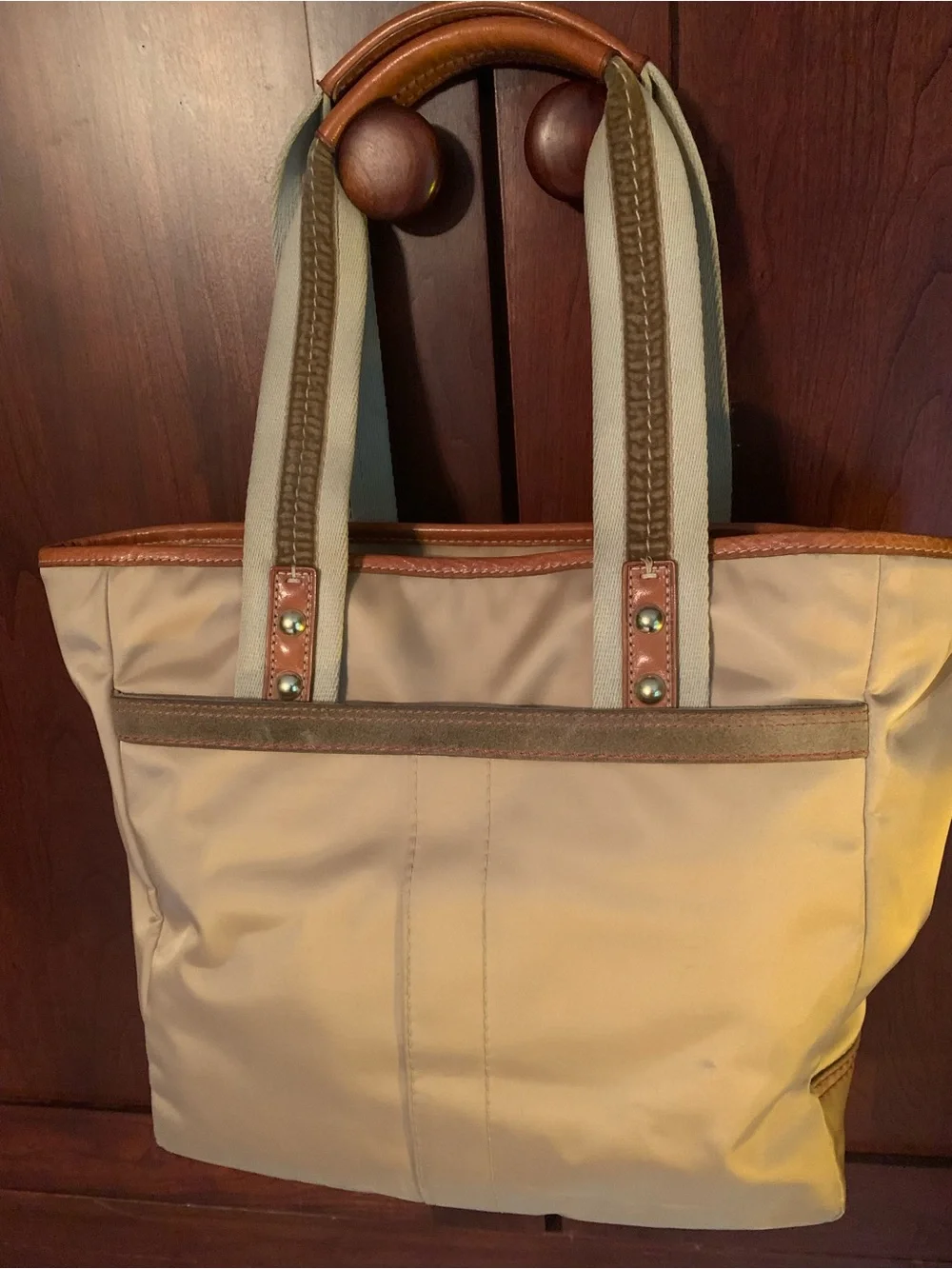 Coach Beige Tote with Tan Leather Trim and Pink/Burgundy Pom Charms